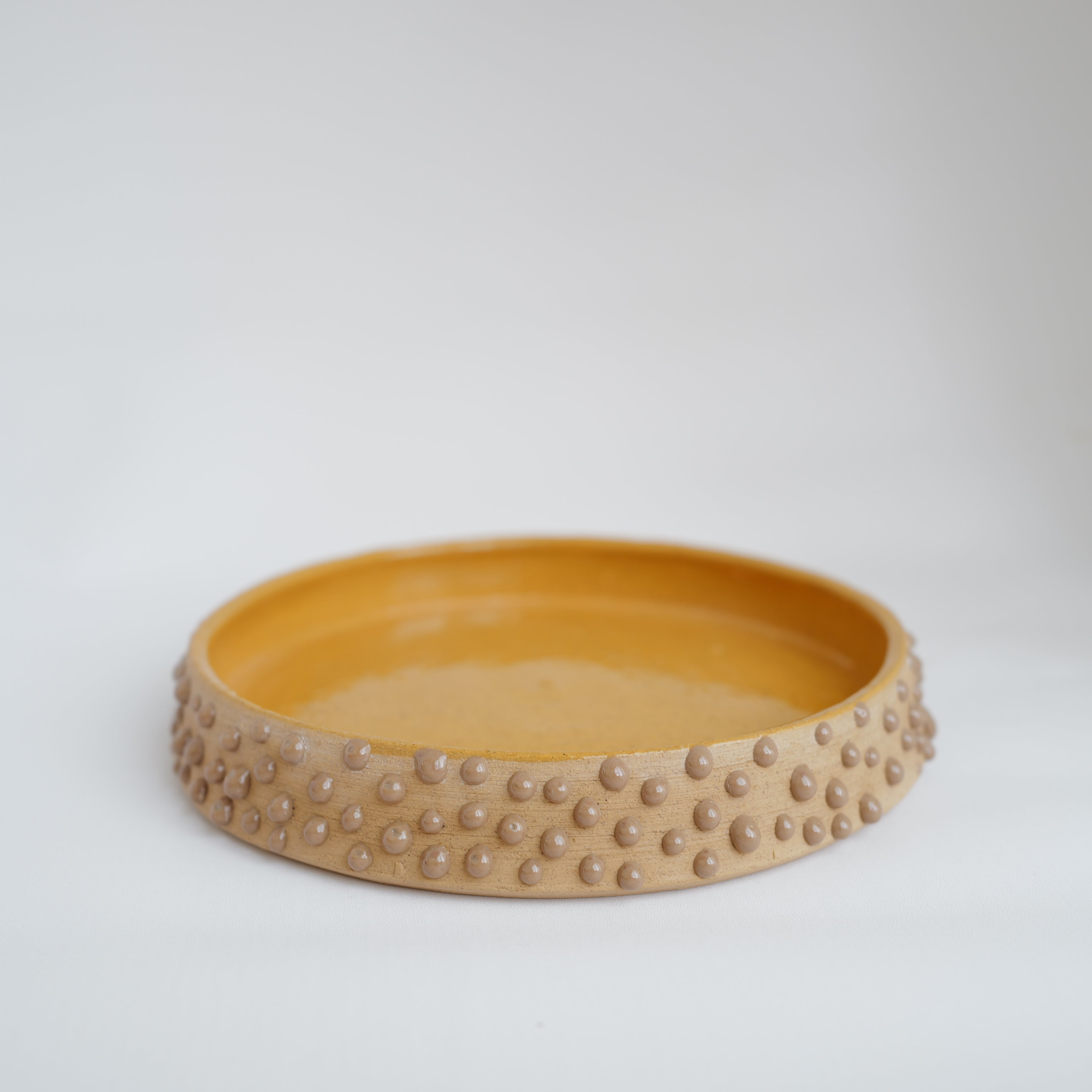 Brown dotted plate